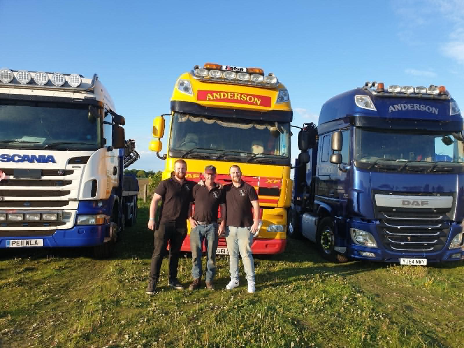 The Anderson family and team with their fleet of lorry loaders
